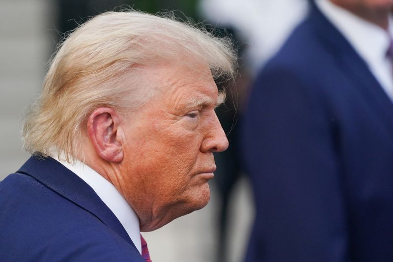 FILE PHOTO: U.S. President Donald Trump attends the Congressional Picnic at the White House in Washington, D.C., U.S., June 12, 2025. REUTERS/Nathan Howard/File photo