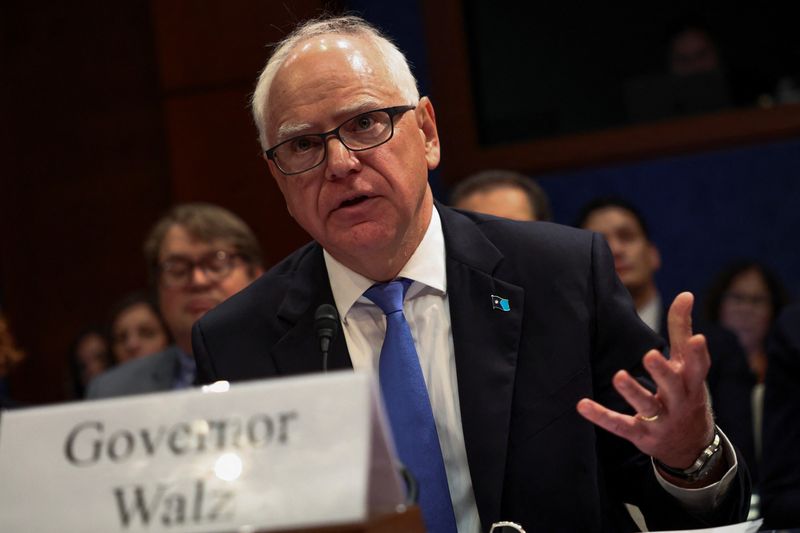 FILE PHOTO: Minnesota Governor Tim Walz testifies during a House Oversight Committee hearing with U.S. governors about state policies regarding undocumented migrants, on Capitol Hill in Washington, D.C., U.S., June 12, 2025. REUTERS/Kevin Lamarque/File photo