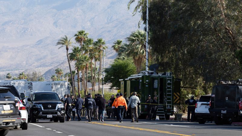 Investigators gather after a bomb exploded near a reproductive health facility in Palm Springs, California, U.S. May 17, 2025.   REUTERS/Amanda Villegas/File Photo