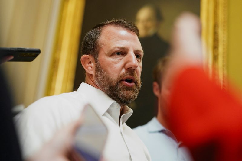 FILE PHOTO: U.S. Senator Markwayne Mullin (R-OK) responds to questions from the media as Republican lawmakers struggle to pass U.S. President Donald Trump’s sweeping spending and tax bill, on Capitol Hill in Washington, D.C., U.S., June 28, 2025. REUTERS/Ken Cedeno/File Photo