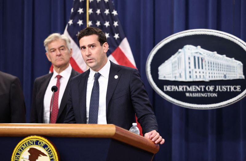 Dr. Mehmet Oz, administrator for the Centers for Medicare & Medicaid Services, listens as Matthew R. Galeotti, head of the Justice Department’s Criminal Division, speaks about a healthcare fraud enforcement action during a press conference at the U.S. Department of Justice in Washington, D.C., U.S., June 30, 2025. REUTERS/Kevin Lamarque