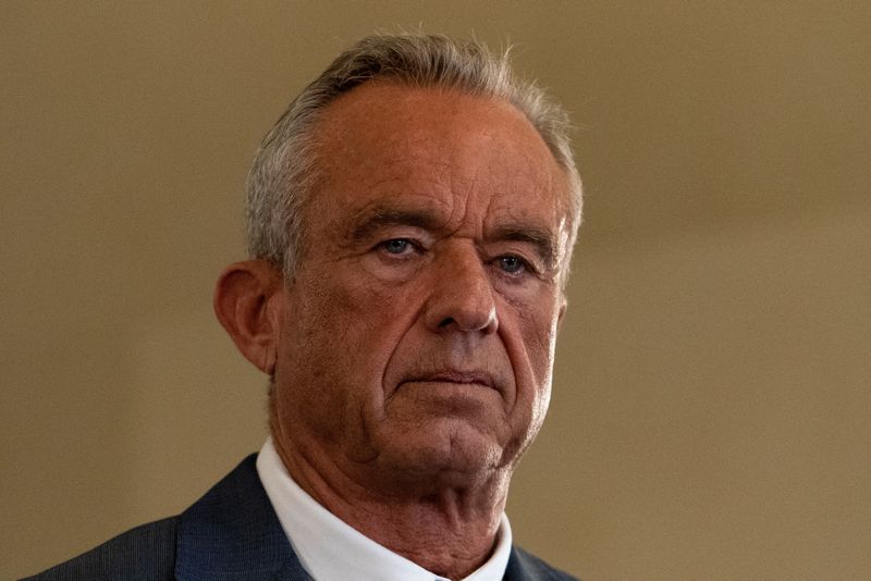 FILE PHOTO: U.S. Health and Human Services (HHS) Secretary Robert F. Kennedy Jr. listens at a Make Oklahoma Healthy Again kickoff event at the Oklahoma State Capitol in Oklahoma City, Oklahoma, U.S. June 26, 2025. REUTERS/Nick Oxford/File Photo
