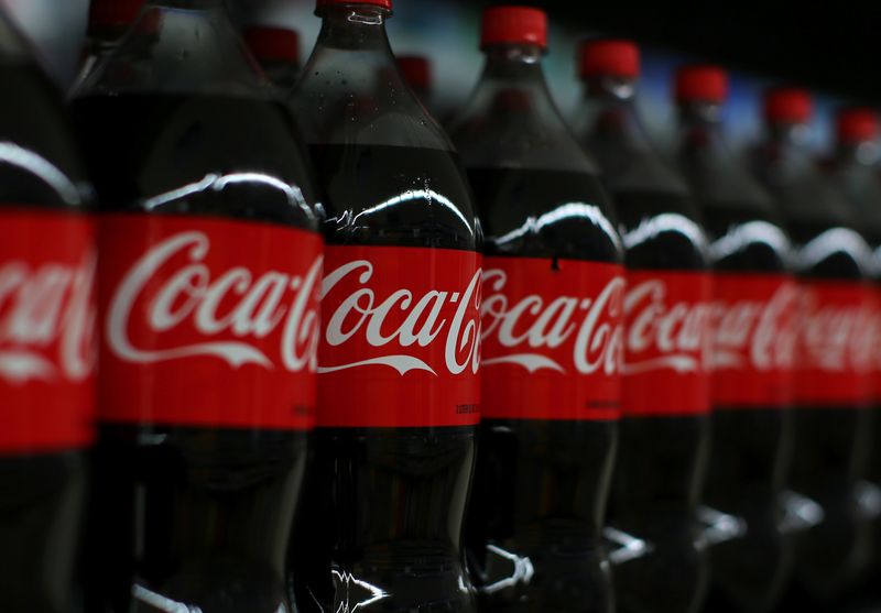 FILE PHOTO: Coca-cola soda is shown on display during a preview of a new Walmart Super Center prior to its opening in Compton, California, U.S., January 10, 2017.  REUTERS/Mike Blake/File photo
