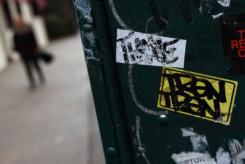 FILE PHOTO: A Tren de Aragua graffiti sticker is seen on a steel beam, as the Trump administration deported more than 200 Venezuelans, alleged members of the Venezuelan gang, to El Salvador over the weekend, in the Elmhurst neighborhood of the borough of Queens in New York City, U.S., March 17, 2025. REUTERS/Shannon Stapleton/File Photo