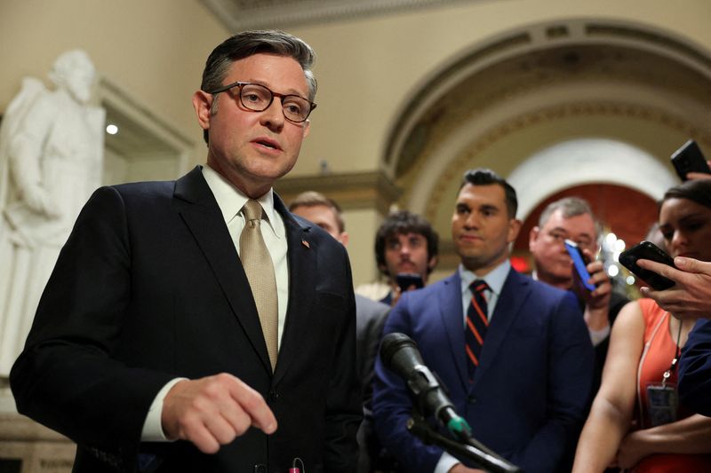 FILE PHOTO: U.S. House Speaker Mike Johnson (R-LA) takes questions from reporters at the Capitol in Washington, D.C., U.S., July 23, 2025. REUTERS/Jonathan Ernst/File Photo