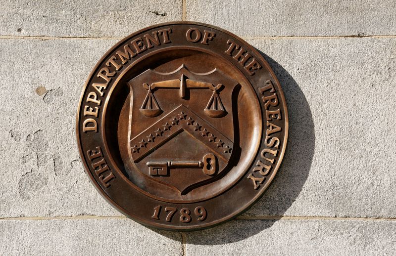 FILE PHOTO: A bronze seal for the Department of the Treasury is shown at the U.S. Treasury building in Washington, U.S., January 20, 2023. REUTERS/Kevin Lamarque/File Photo
