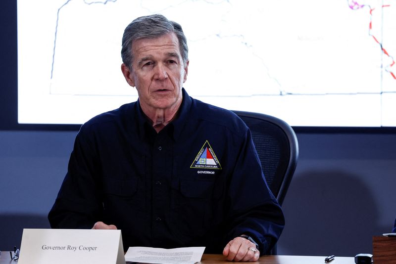 North Carolina Governor Roy Cooper attends a briefing on the Hurricane Helene response at the Emergency Operations Center in Raleigh, North Carolina, U.S., October 2, 2024. REUTERS/Evelyn Hockstein/File Photo