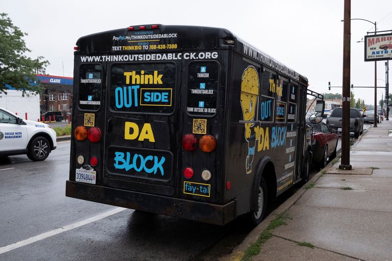 A bus belonging to the Think Outside Da Block gun violence prevention program sits parked outside of the organization’s office, in Chicago, Illinois, U.S., July 25, 2025.  REUTERS/Jim Vondruska