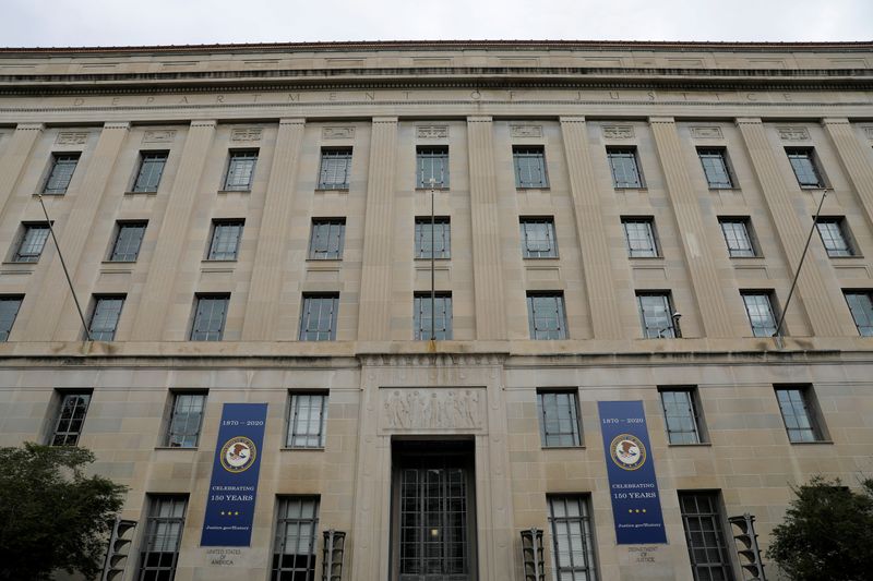 Signage is seen at the headquarters of the United States Department of Justice (DOJ) in Washington, D.C., U.S., May 10, 2021. REUTERS/Andrew Kelly/File Photo