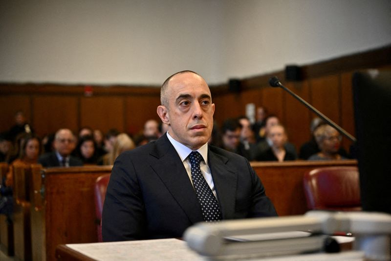 FILE PHOTO: Attorney Emil Bove looks on as U.S. President-elect Donald Trump appears remotely for a sentencing hearing in front of New York State Judge Juan Merchan in the criminal case in which he was convicted in 2024 on charges involving hush money paid to a porn star, at New York Criminal Court in Manhattan in New York City, U.S., on January 10, 2025. ANGELA WEISS/Pool via REUTERS/File Photo