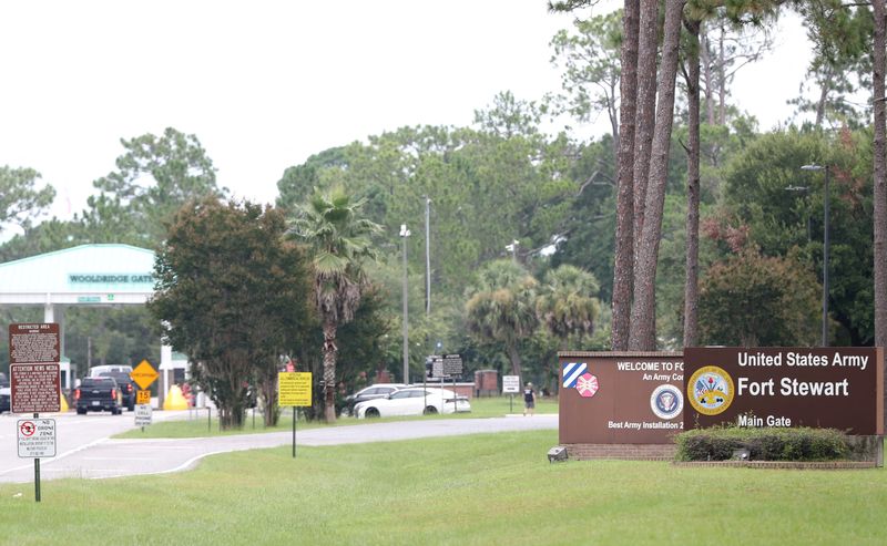 Traffic enters Fort Stewart at the main entrance gate following an active shooter incident on the U.S. Army base located in Hinesville, Georgia, U.S. August 6, 2025.    Richard Burkhart/USA Today Network via REUTERS.