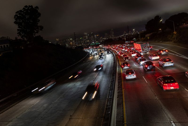 FILE PHOTO: Car traffic is seen during rush hour in downtown San Francisco, California, U.S., July 29, 2025. REUTERS/Carlos Barria/File photo