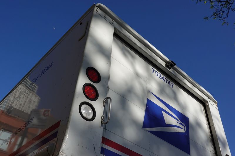 A United States Postal Service (USPS) mail delivery truck is seen in Queens, New York City, U.S., May 9, 2022. REUTERS/Andrew Kelly
