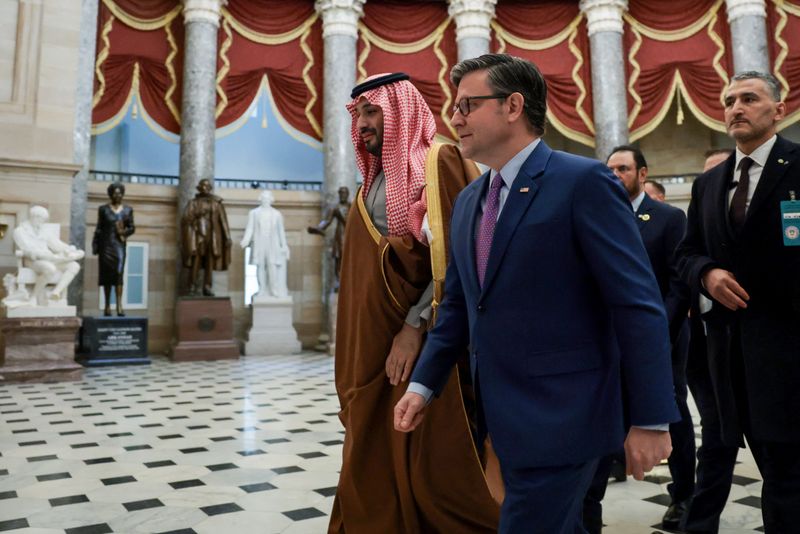 Saudi Crown Prince and Prime Minister Mohammed bin Salman and U.S. House Speaker Mike Johnson (R-LA) walk through Statuary Hall at the U.S. Capitol, on their way to a meeting with members of Congress, on Capitol Hill in Washington, D.C., U.S., November 19, 2025. REUTERS/Jonathan Ernst