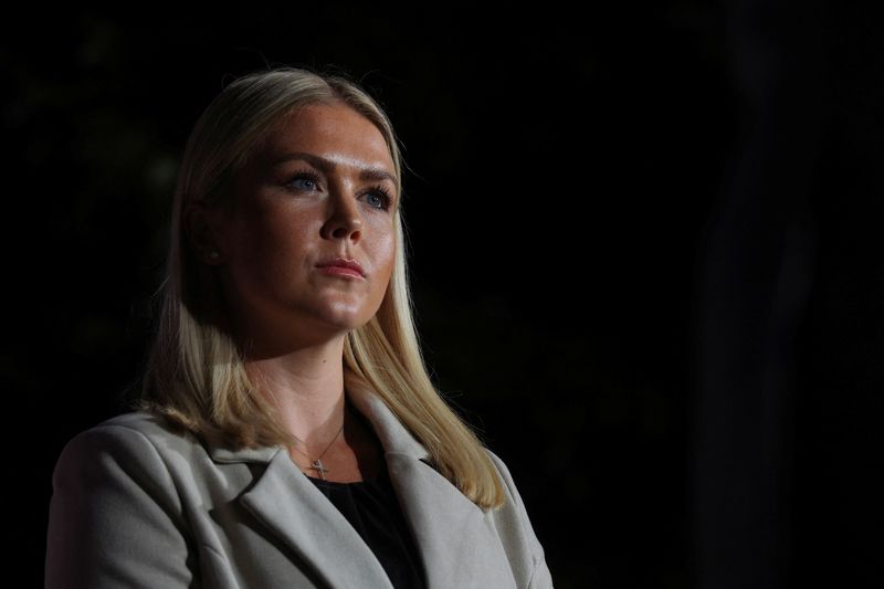 Republican candidate for the U.S. House of Representatives Karoline Leavitt listens during a Get Out the Vote Rally with U.S. Senator Ted Cruz (R-TX) (not pictured) in Londonderry, New Hampshire, U.S., September 8, 2022. REUTERS/Brian Snyder