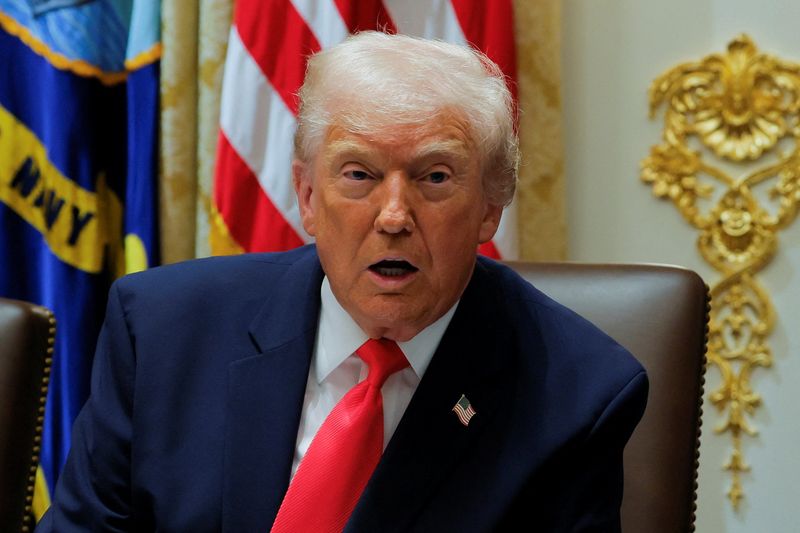 U.S. President Donald Trump attends a cabinet meeting at the White House in Washington, D.C., U.S., December 2, 2025. REUTERS/Brian Snyder