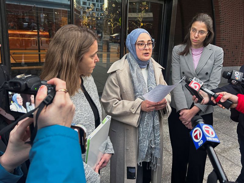 Rumeysa Ozturk, a Tufts University student from Turkey, speaks to reporters after urging a federal judge to order the Trump administration to restore her student visa record, outside the federal court in Boston, Massachusetts, U.S., December 4, 2025. REUTERS/Nate Raymond