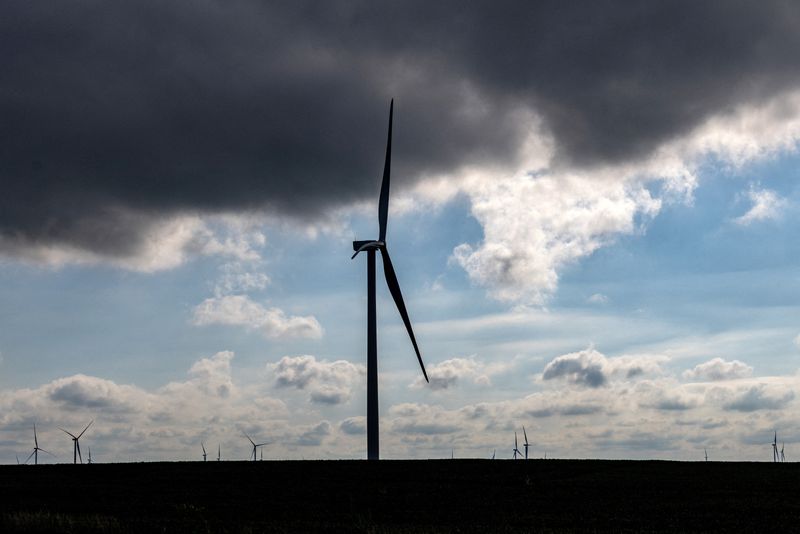 FILE PHOTO: Wind turbines dot the landscape outside of Bloomington, Illinois, U.S., August 19, 2025. REUTERS/Evelyn Hockstein/File Photo