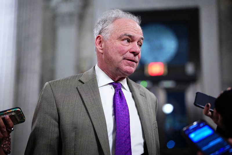 U.S. Senator Tim Kaine (D-VA) speaks to reporters outside the Senate Chamber on the 40th day of the partial government shutdown, in Washington, D.C., U.S., November 9, 2025. REUTERS/Aaron Schwartz