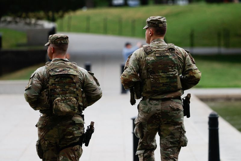 Members of the Ohio National Guard patrol at the National Mall, weeks after U.S. President Donald Trump ordered an increased presence of federal law enforcement to assist in crime prevention, in Washington, D.C. U.S., September 16, 2025. REUTERS/Daniel Becerril
