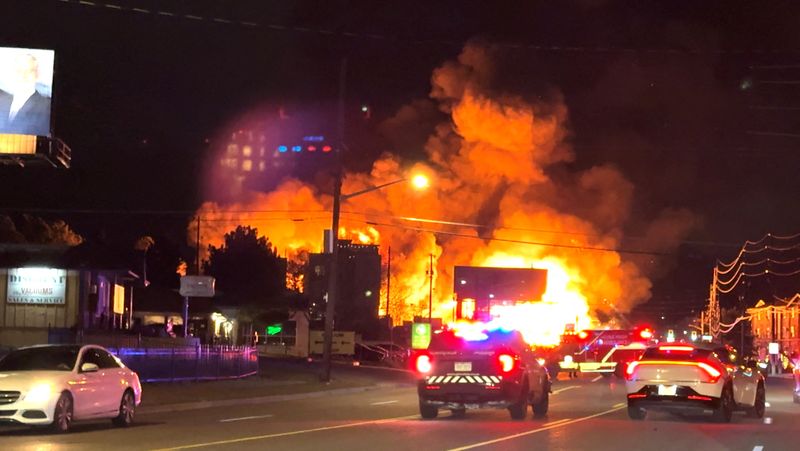 Smoke and flames rise from the site of a burning building, in Denver, Colorado, U.S., January 2, 2026, in this still image obtained from a social media video, video taken behind glass.  X @DaLitiGator/via REUTERS