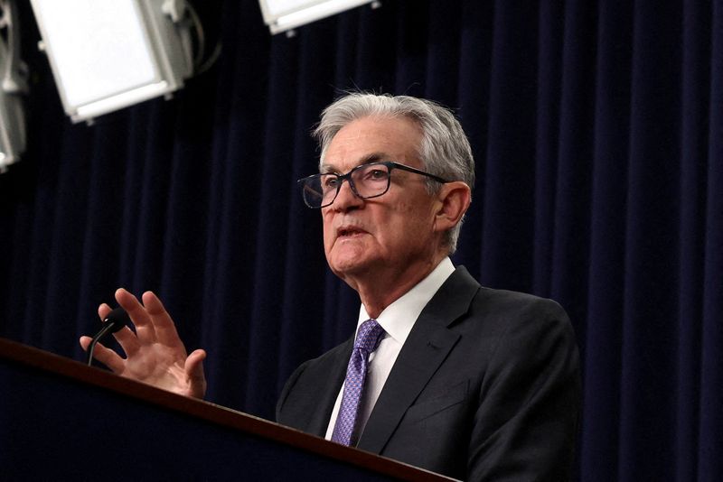 FILE PHOTO: U.S. Federal Reserve Chair Jerome Powell holds a press conference following a two-day meeting of the Federal Open Market Committee, at the U.S. Federal Reserve in Washington, D.C., U.S., December 10, 2025. REUTERS/Kevin Lamarque/File Photo