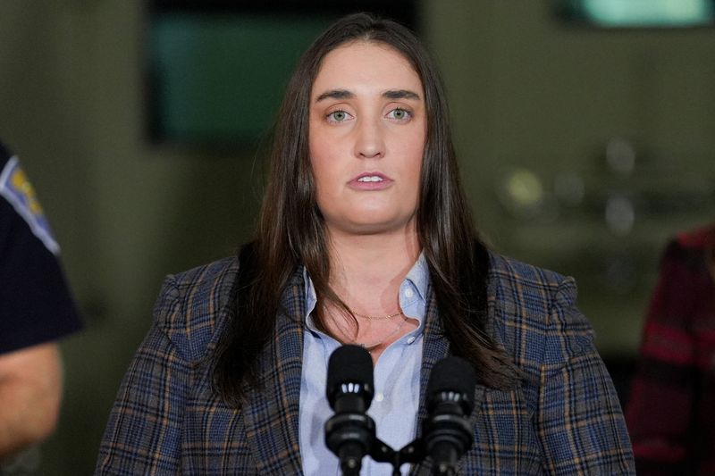 Immigration and Customs Enforcement (ICE) Deputy Director Madison Sheahan speaks during a press conference about 'Operation Midway Blitz', an immigration enforcement campaign, from a hangar in Gary, Indiana, U.S., October 30, 2025. REUTERS/Leah Millis