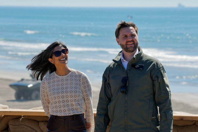 FILE PHOTO: U.S. Vice President JD Vance and second lady Usha Vance attend the 250th anniversary celebration of the United States Marine Corps at Camp Pendleton, California, U.S., October 18, 2025.   REUTERS/Mike Blake/File Photo