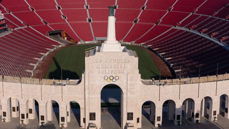 A drone view of Los Angeles Coliseum, as it was announced it will host the opening ceremonies of the 2028 Olympics along with SoFi Stadium in a dual event, closing ceremony, and host the opening of the Paralympic Games in 2028, making it the first facility to host events for 3 Olympic Games in Los Angeles, California, U.S., May 8, 2025. REUTERS/Mike Blake