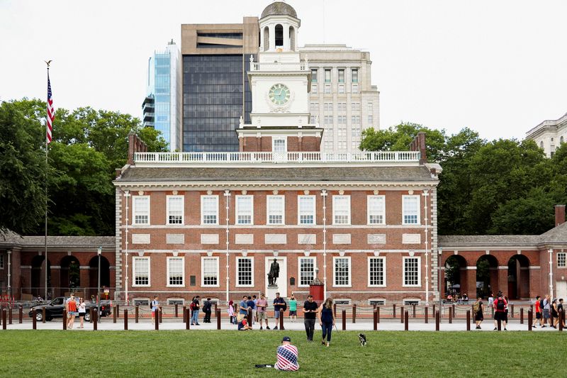 FILE PHOTO: People spend time at Independence National Historical Park in Philadelphia, Pennsylvania, U.S., July 4, 2021.  REUTERS/Hannah Beier/File Photo