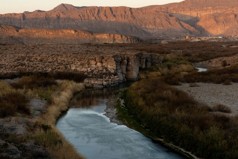 The sun sets over the Rio Grande River separating Mexico and the United States in Big Bend National Park, Texas, U.S., February 22, 2025. REUTERS/Cheney Orr