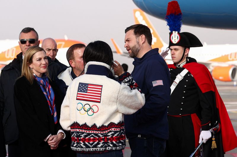 U.S. Ambassador to Italy and San Marino Tilman Fertitta and his wife Paige Fertitta welcome U.S. Vice President JD Vance and second lady Usha Vance as they arrive, ahead of the Milano Cortina 2026 Winter Olympics in Milan, Italy, February 5, 2026. REUTERS/Kevin Lamarque/Pool