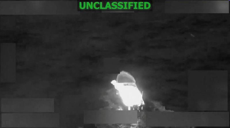 A vessel on fire after an explosion, which the U.S. military says was a strike on a suspected drug vessel in Eastern Pacific, in an unidentified location in this screen grab obtained from a video released on February 5, 2026. US Southern Command/Handout via REUTERS