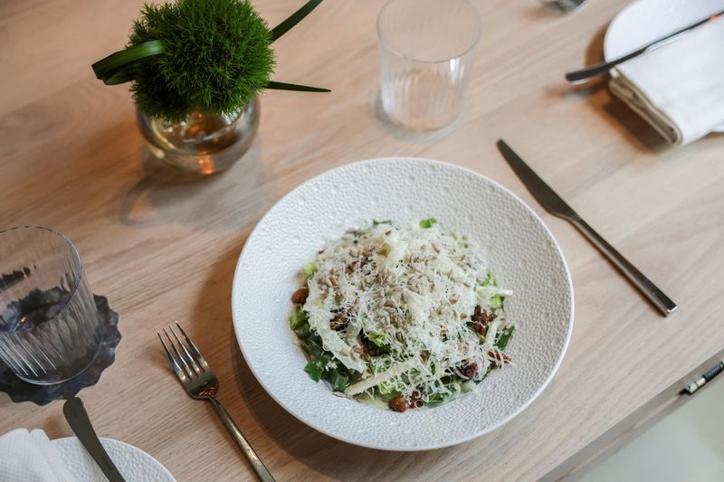 FILE PHOTO: A Waldorf salad is on display at Lex Yard at the Waldorf Astoria Hotel in midtown Manhattan in New York City, U.S., July 23, 2025. REUTERS/Jeenah Moon/File Photo