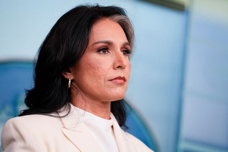Director of National Intelligence (DNI) Tulsi Gabbard looks on during a press briefing, at the White House in Washington, D.C., U.S., July 23, 2025. REUTERS/Kent Nishimura