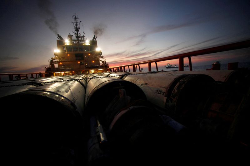FILE PHOTO: Risers, the outer casings of oil drill pipes, are seen on the deck of the service vessel Joe Griffin as it prepares to head to Port Fouchon at the site of the Deepwater Horizon oil spill in the Gulf of Mexico, off the coast of Louisiana, May 11, 2010.  REUTERS/Gerald Herbert/Pool/File Photo