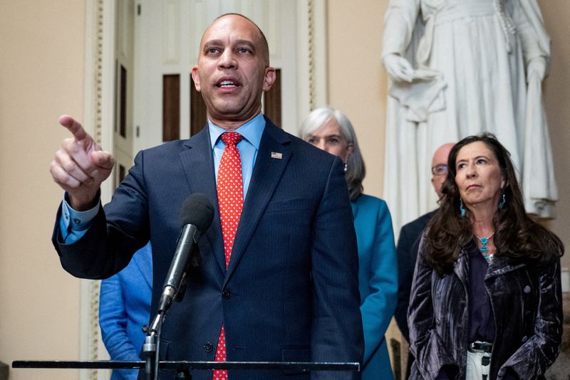 FILE PHOTO: U.S. House Minority Leader Hakeem Jeffries speaks to press as members of the U.S. House of Representatives head back to Washington on Tuesday, after a 53-day break, for a vote that could bring the longest U.S. government shutdown in history to a close, on Capitol Hill in Washington, D.C., U.S., November 11, 2025. REUTERS/Annabelle Gordon/File Photo