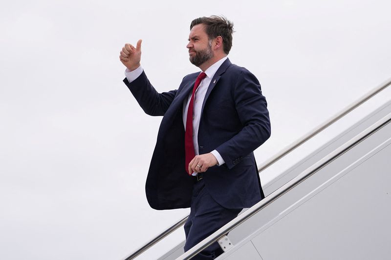 U.S. Vice President JD Vance gestures as he steps off Air Force Two at Central Wisconsin Airport in Mosinee, Wisconsin, U.S., February 26, 2026. Matt Rourke/Pool via REUTERS