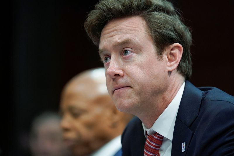 FILE PHOTO: Denver Mayor Mike Johnston looks on during a House Oversight and Accountability Committee hearing to examine the jurisdiction of "sanctuary cities" and its impact on federal immigration policy, on Capitol Hill in Washington, D.C., U.S., March 5, 2025. REUTERS/Kent Nishimura/ File Photo