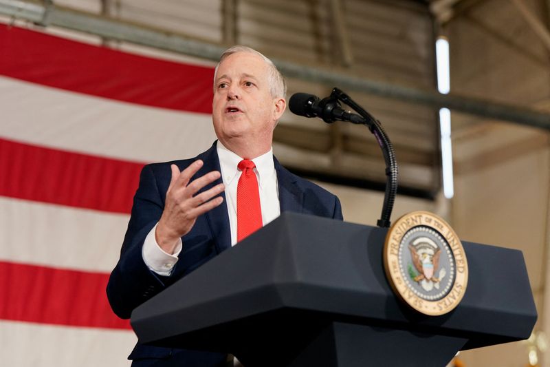 Republican U.S. Senate candidate Michael Whatley speaks as U.S. President Donald Trump visits Fort Bragg, North Carolina, U.S., February 13, 2026. REUTERS/Elizabeth Frantz