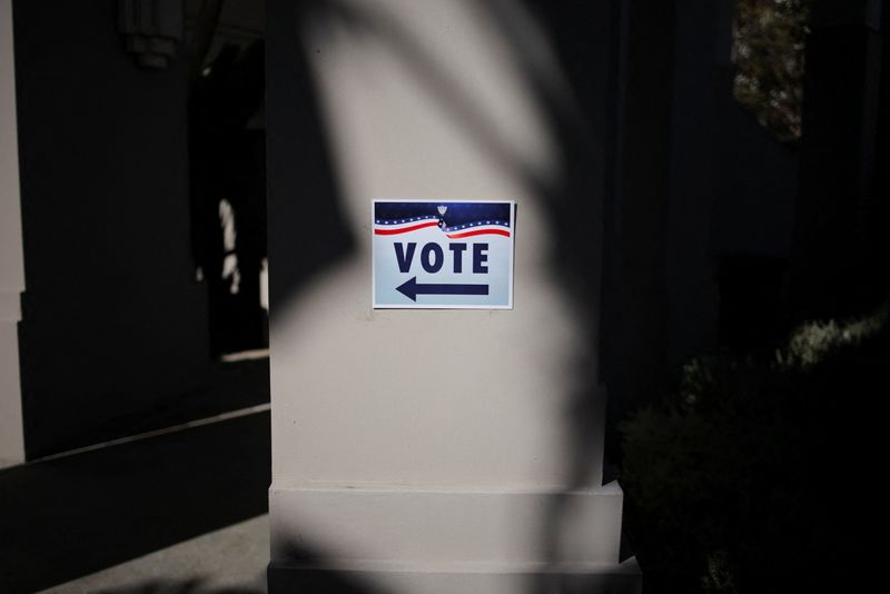 A sign directing voters to the Beverly Hills City Hall voting center in Beverly Hills, California, U.S., October 30, 2025. REUTERS/Daniel Cole