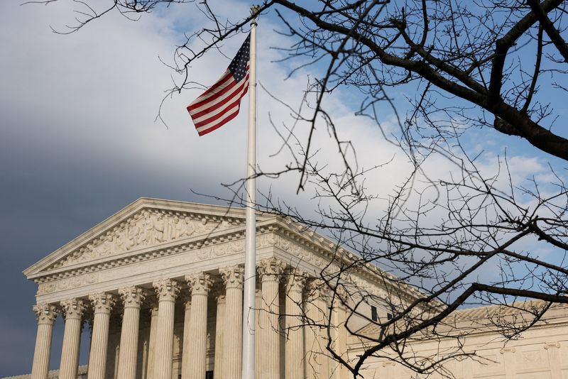 FILE PHOTO: An American flag flies outside the U.S. Supreme Court in Washington, D.C., U.S., February 25, 2026. REUTERS/Kylie Cooper/File Photo