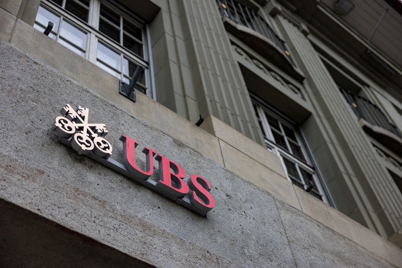 FILE PHOTO: The UBS logo is pictured on a building next to the Federal Palace of Switzerland, in Bern, Switzerland, December 11, 2025. REUTERS/Pierre Albouy/File Photo