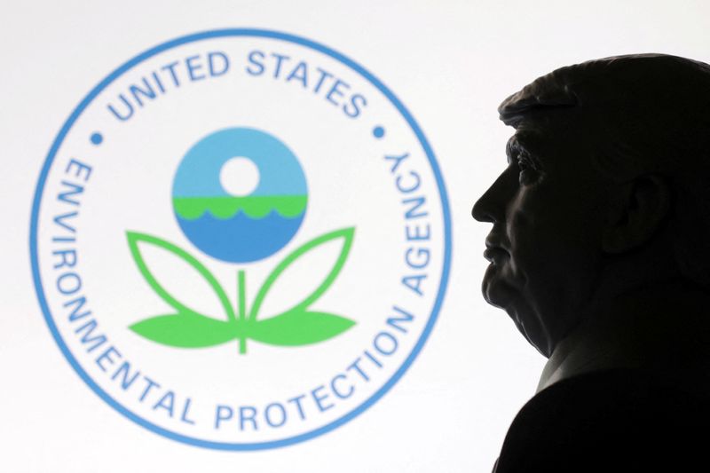 A 3D-printed miniature model of U.S. President Donald Trump with the Environmental Protection Agency logo in the background is seen in this illustration taken April 23, 2025. REUTERS/Dado Ruvic/Illustration