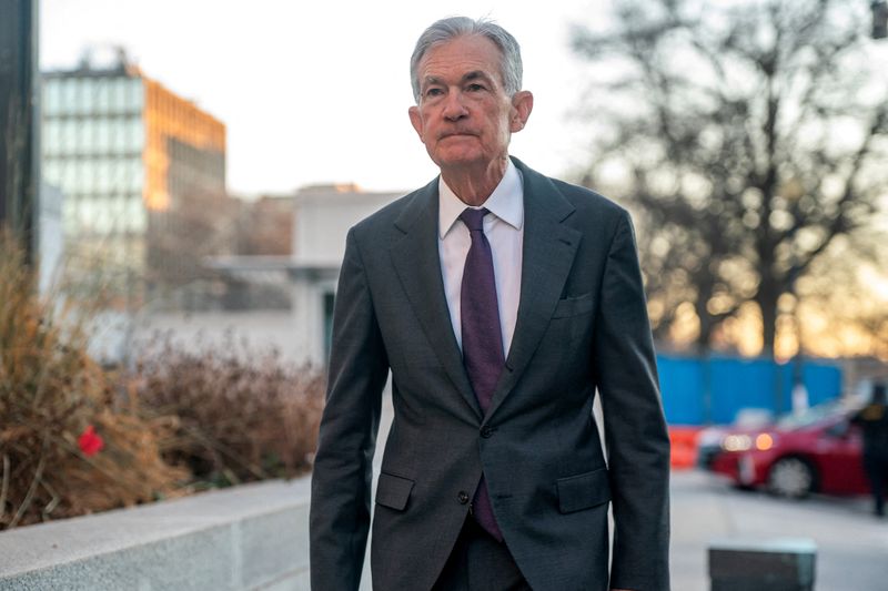 FILE PHOTO: Federal Reserve Chair Jerome Powell arrives at the U.S. Federal Reserve in Washington, U.S., January 13, 2026. REUTERS/Nathan Howard/File Photo