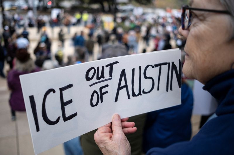 Christi Eubank protests against cooperation of the city of Austin with U.S. Immigration and Customs Enforcement (ICE) agents, in Austin, Texas, U.S., January 20, 2026.   REUTERS/Joel Angel Juarez