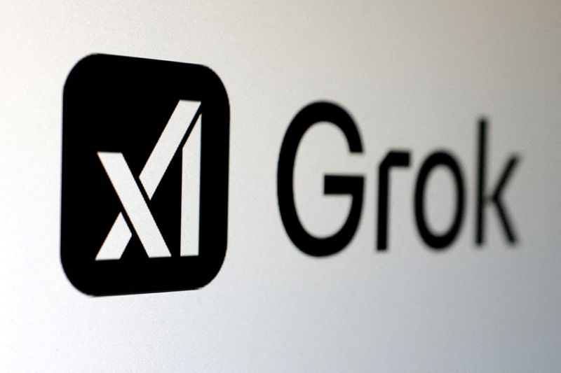 FILE PHOTO: xAI and Grok logos are seen in this illustration taken, February 16, 2025. REUTERS/Dado Ruvic/Illustration/File Photo