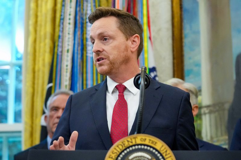 Director of Medicare and Deputy Administrator of CMS Chris Klomp speaks after U.S. President Donald Trump announced a deal with Pfizer to sell drugs at lower prices, in the Oval office of the White House in Washington, D.C., U.S., September 30, 2025. REUTERS/Ken Cedeno