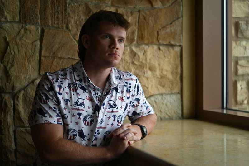 Noah Bundy, 17, Republican, poses for a picture as he attends the Conservative Political Action Conference (CPAC) USA 2026 at the Gaylord Texan Resort and Convention Center, in Grapevine, Texas, U.S. March 27, 2026.  REUTERS/Callaghan O'Hare