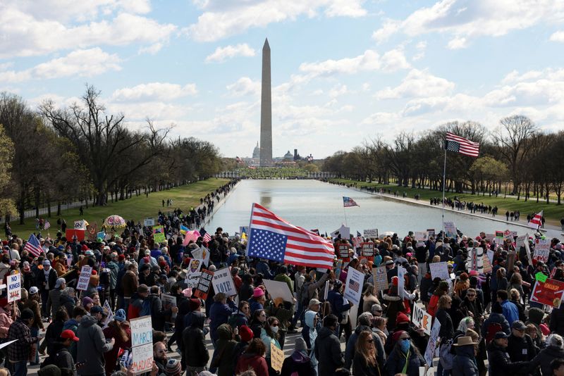 Demonstrators participate in a "No Kings" protest as part of nationwide demonstrations against U.S. President Donald Trump's administration policies, in Washington, D.C., U.S., March 28, 2026. REUTERS/Evelyn Hockstein